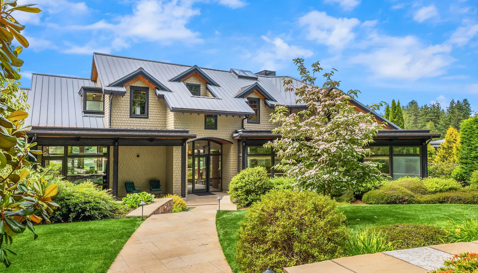Lush gardens, stunning architecture and expertly executed construction ground the home 