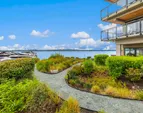 Landscaped path to common area on the water
