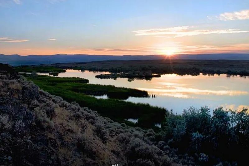 Beautiful vistas. Sun setting in the West. Mountain ridges ideal for home-sites. Additional sites around the lake provide dramatic vistas for additional home-sites. Hilltop Lake below with island in middle. Beautiful vistas. Sun setting in the West. Mountain ridges ideal for home-sites. Additional sites around the lake provide dramatic vistas for additional home-sites. Hilltop Lake below with island in middle.