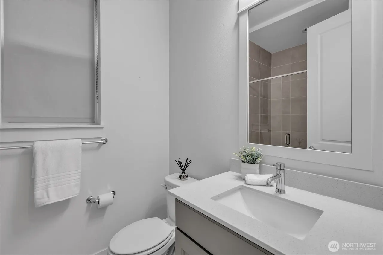 Main level three quarter bathroom/powder room.