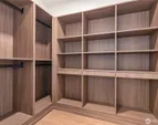Primary walk-in closet.