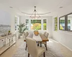 Formal dining room with a great view of the outdoors.