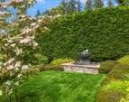 The artist designed garden fountain helps this space capture all the senses. 