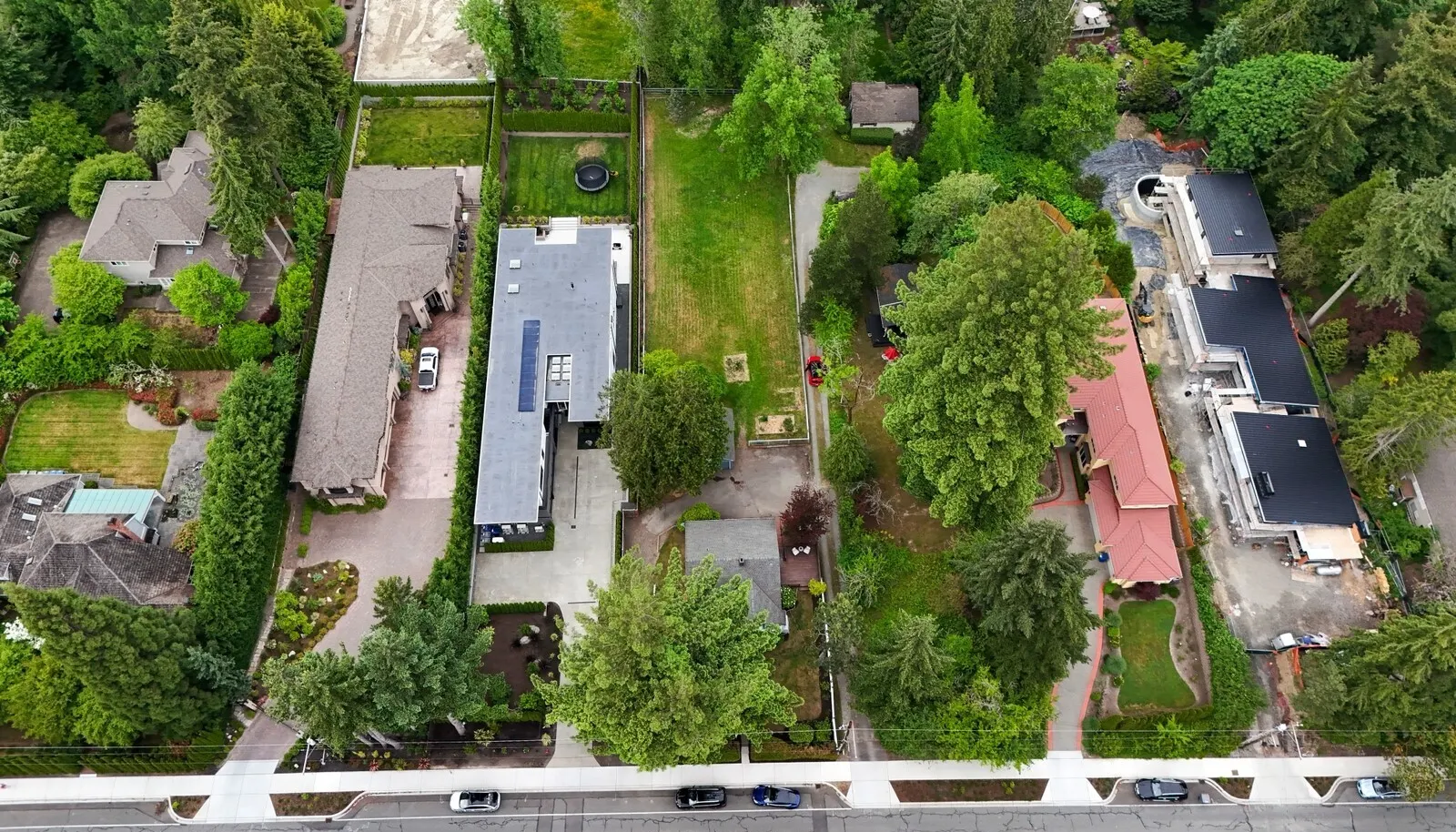 With variance, Medina should allow for a similar footprint and setbacks to the homes to the west of this property. This lot would have a flat backyard.