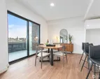Showroom units Living room. Finishes vary by unit. Furniture not included in sale.