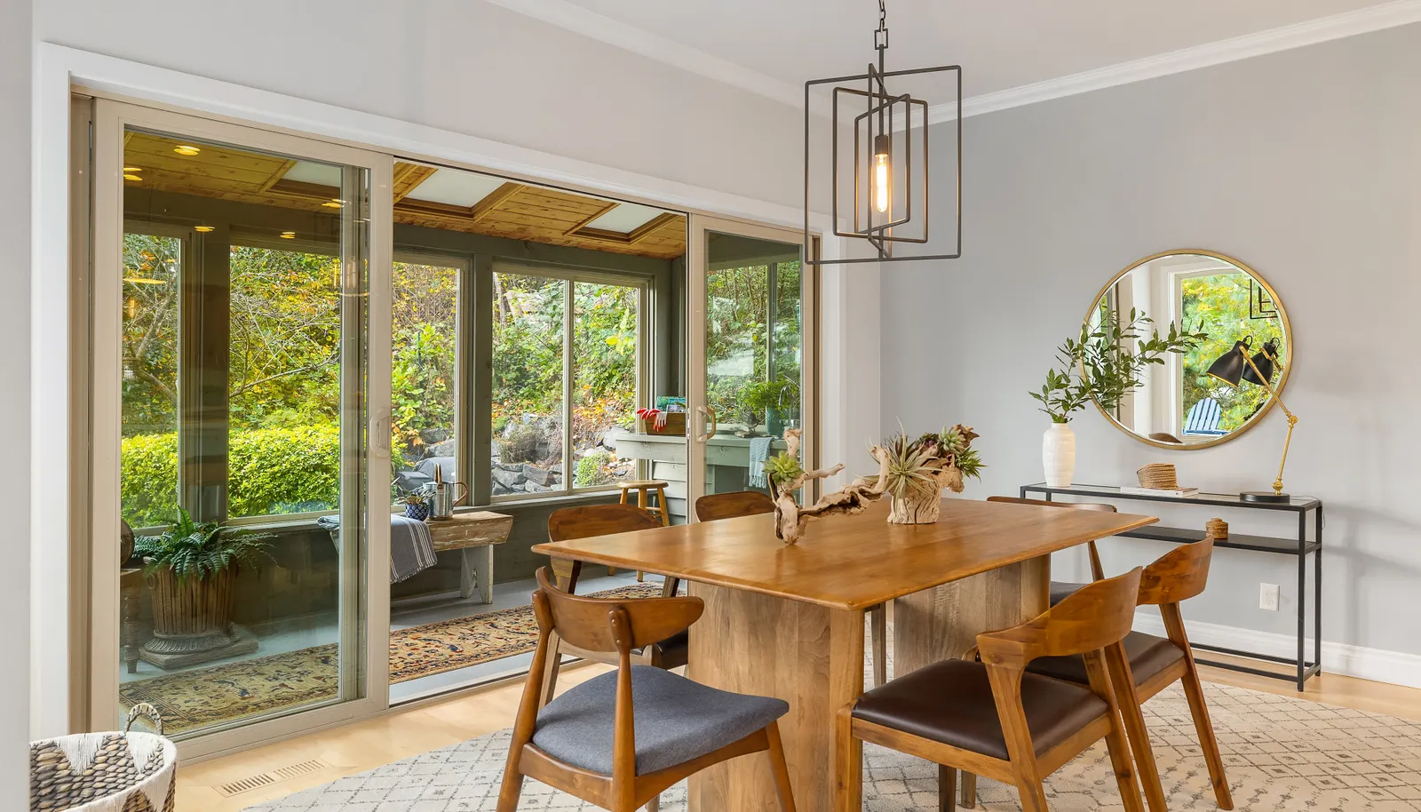The dining room is open to the living room, kitchen and garden room