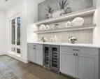 Built-In Buffet w/ Tile Accent Wall, Beverage Center + Under Shelving Lighting.