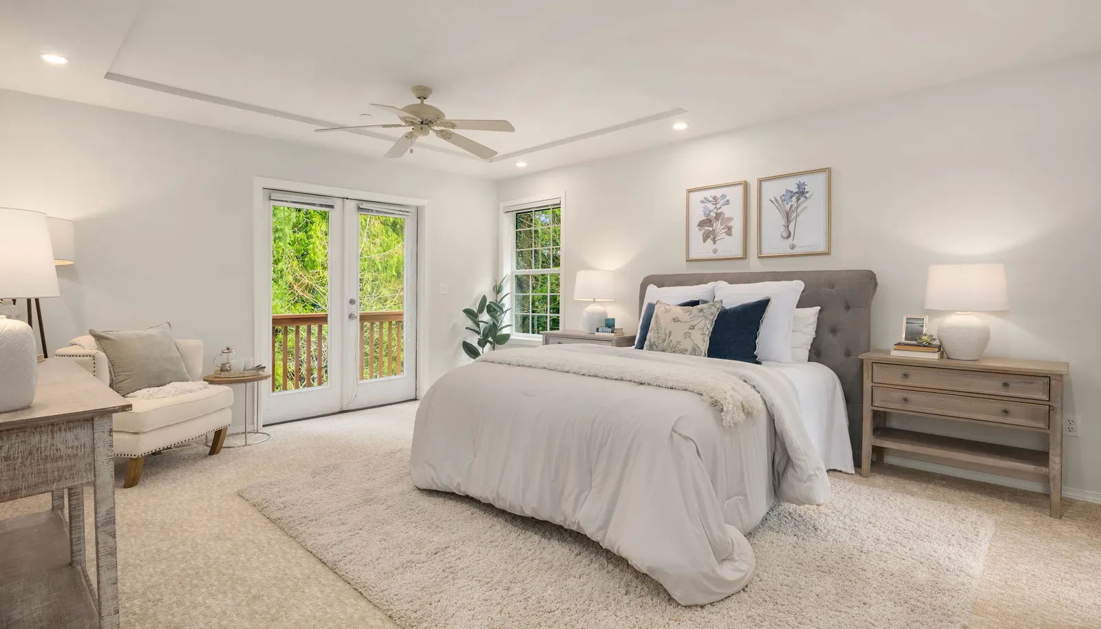 Spacious primary bedroom which opens to a private deck.