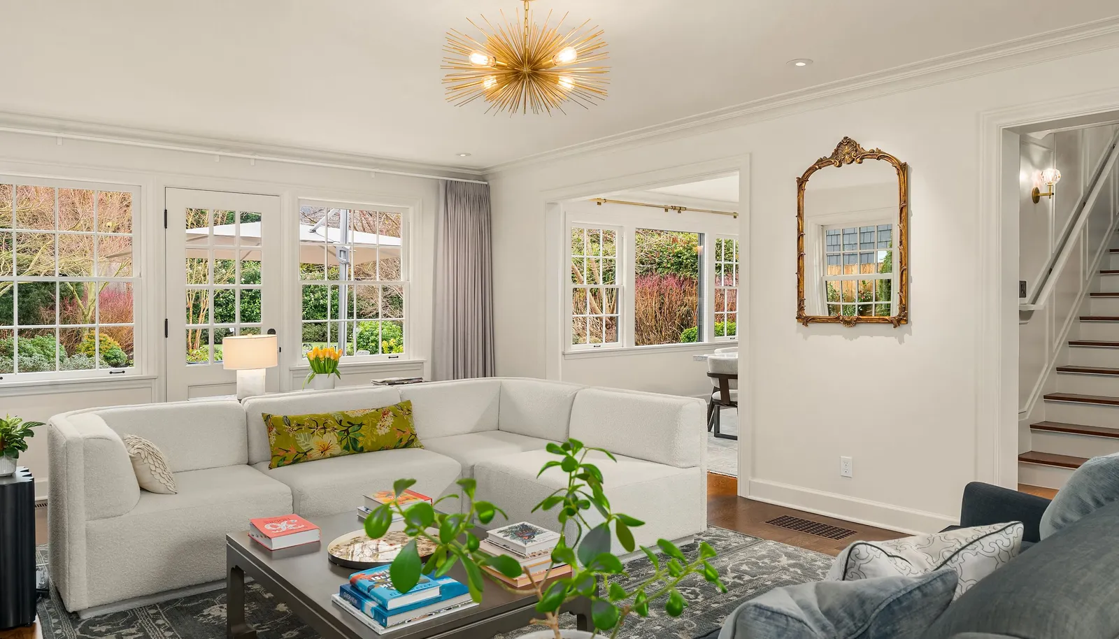 From this angle you can see the staircase leading to the second level and the opening to the dining room & kitchen.