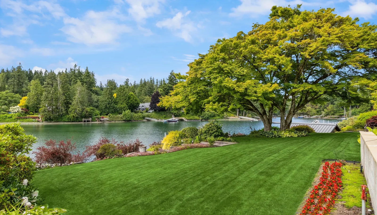 There is nothing like a waterfront lawn! A great place to play all summer long! And the gorgeous maple provides an ideal space to be shaded from the warm sun. 
