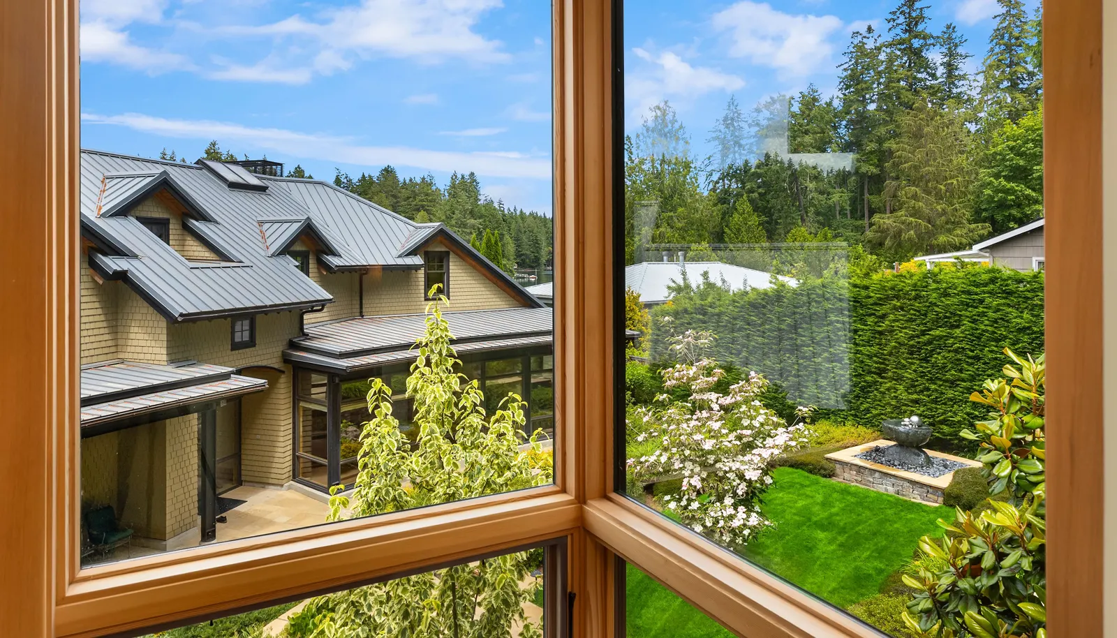 Looking from the studio over the garage, over the gardens to the main house. 