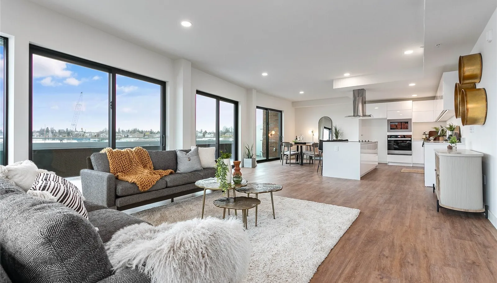 Showroom units Living room. Finishes vary by unit. Furniture not included in sale.