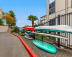 Fantastic paddleboard and kayak storage area with easy water access.