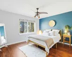 Serene primary suite designed for comfort and relaxation at the end of the day.