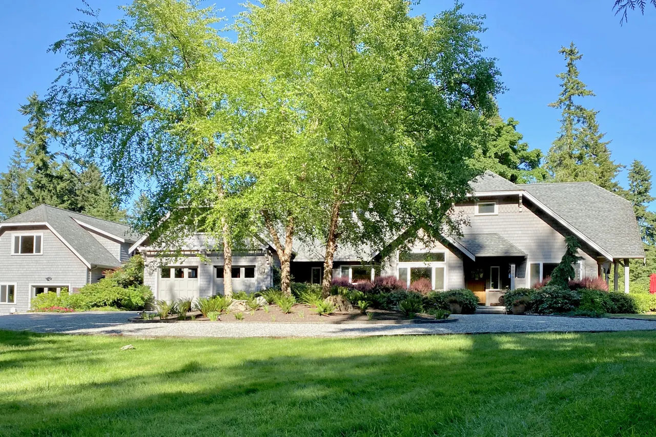 1.2+ acres: Manicured lawns, colorful gardens