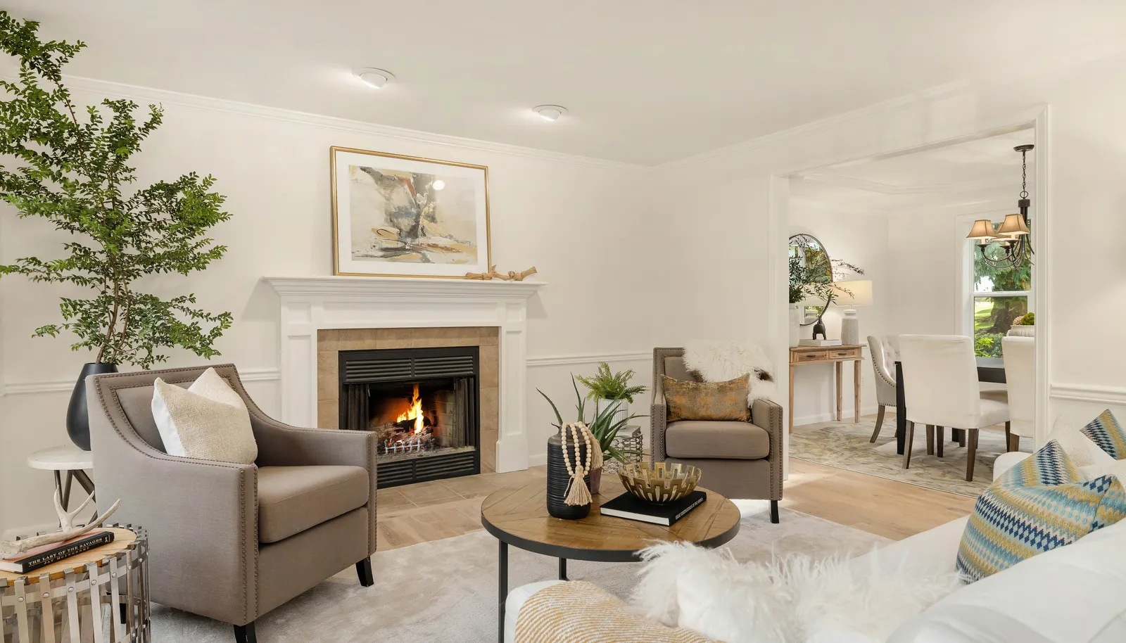 Retire to the living room from the adjacent dining room. Brand new wide plank oak floors!