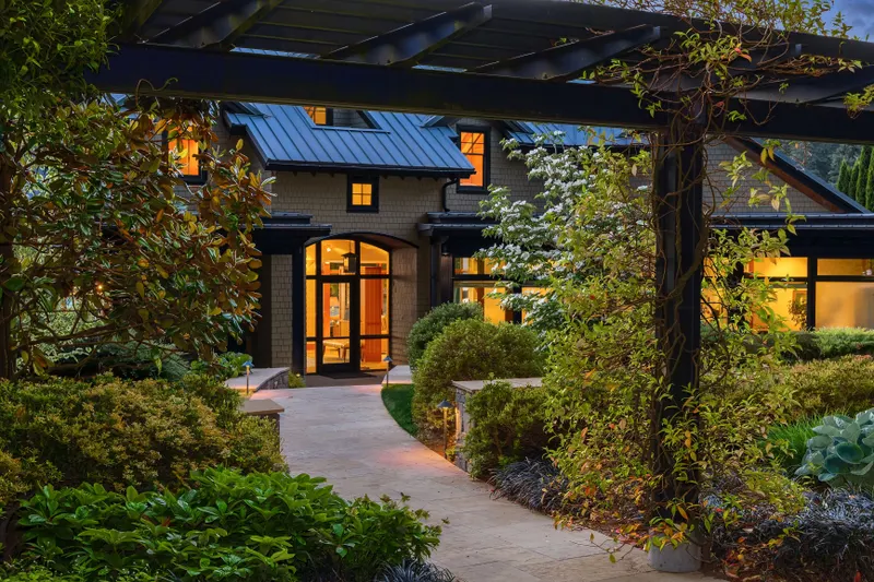 Set on .7+ acres with 110' of pristine, protected shoreline in coveted Fletcher Landing