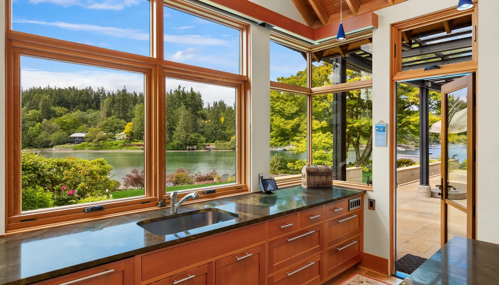 The sink overlooking the back yard and waterfront