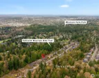 Surrounded by trees and nearby trails, setting offers a balance of privacy and connection to nature while remaining close to everyday amenities.