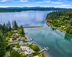Fletcher Landing's unique shoreline and protected bay has attracted vacationers and homesteaders since the late 1800's, enjoying a social center, vacation cottages, dance pavilion and the convenience 