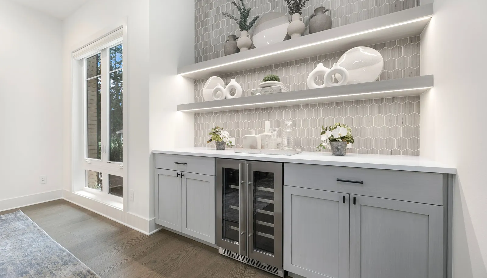 Built-In Buffet w/ Tile Accent Wall, Beverage Center + Under Shelving Lighting.