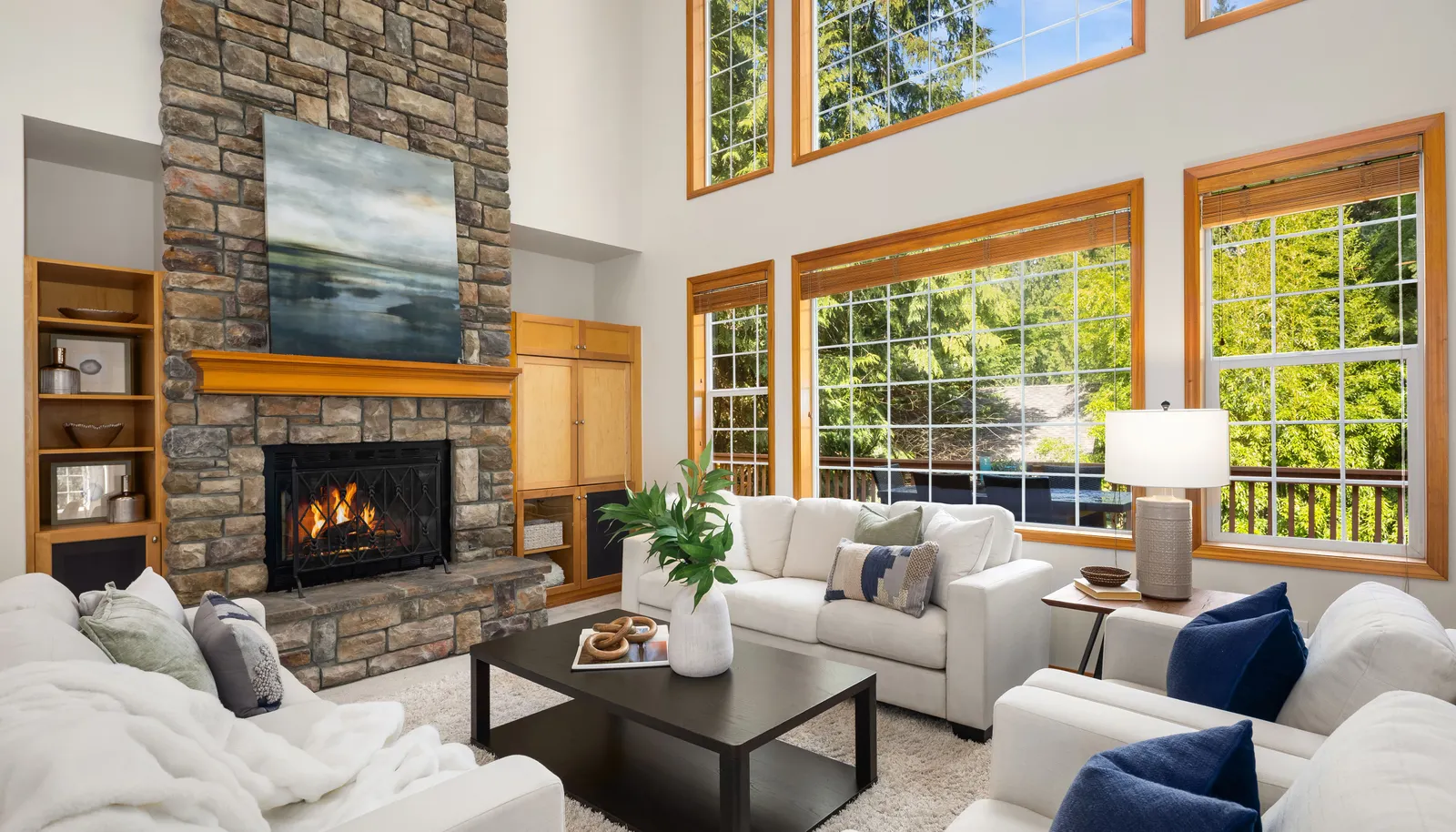 A striking stone fireplace, and a grand open great room is perfect for both intimate gatherings and large celebrations.