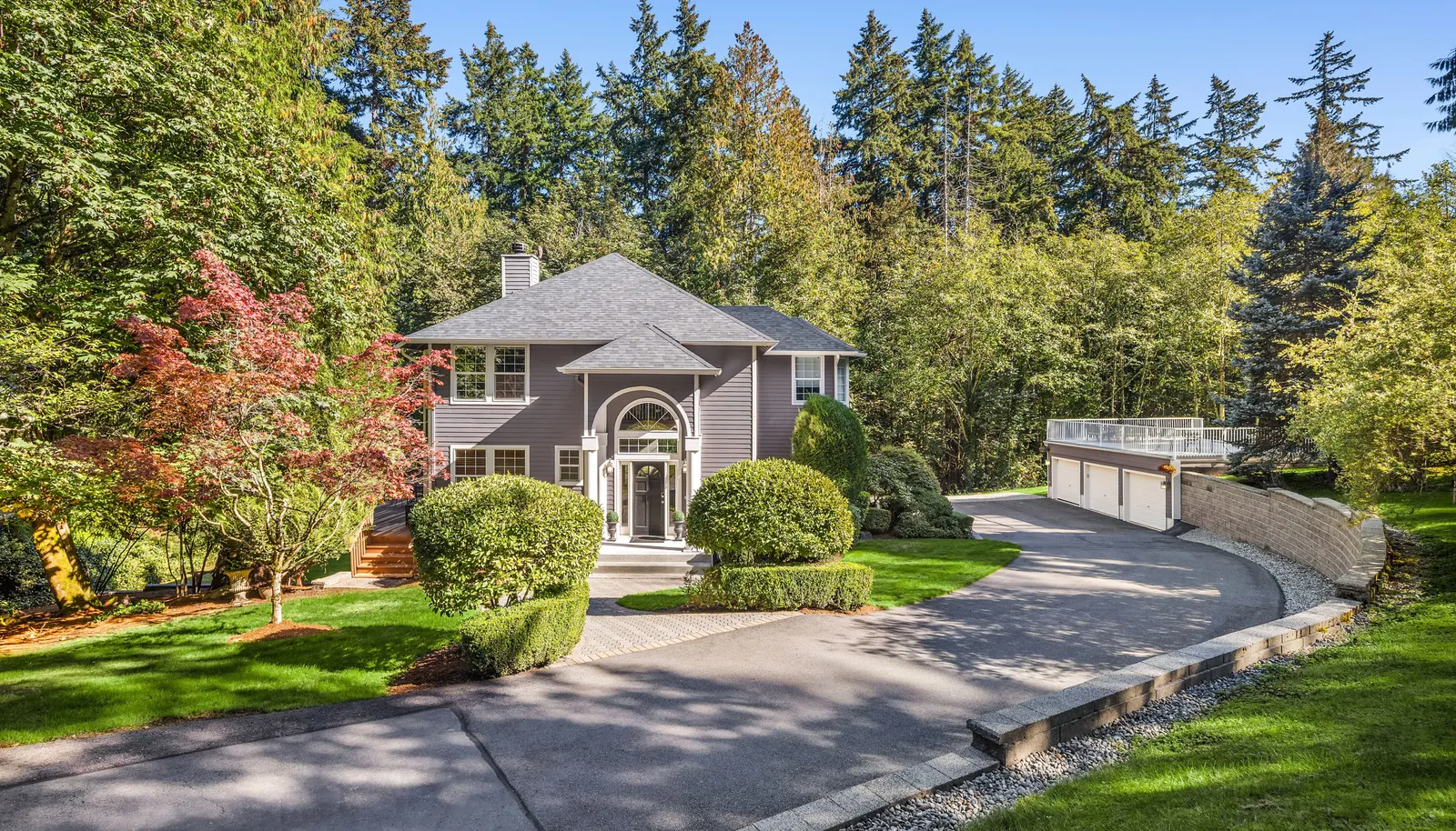 Nestled on a meticulously manicured 41,872 SF lot
